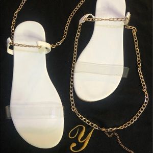 White sandals with gold chain